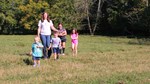 Caroline Holt and kids in field 