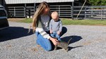 MiCayla Giffin and son petting cat 