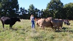 MiCayla Giffin and son in field