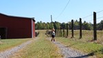 Stephanie Barnett's Daughter outside barn